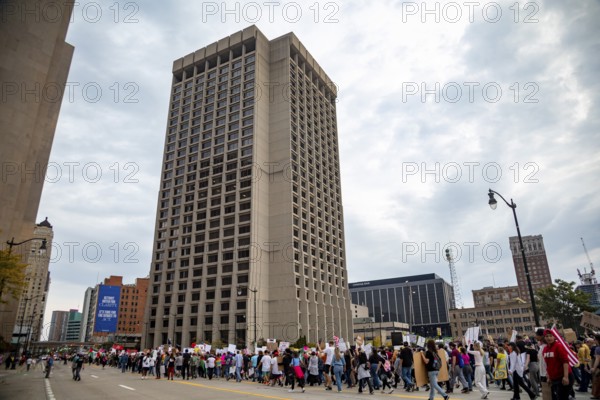 Detroit, Michigan USA - 18 October 2025 - A large crowd marched past the Federal Building during a 'No Kings' rally, protesting President Trump's actions against immigrants and against democratic institutions
