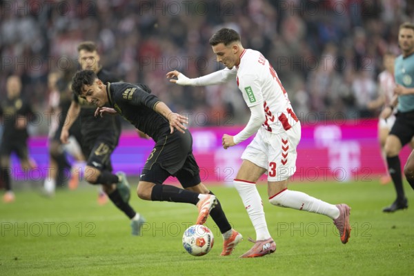 Dimitris Giannoulis (FC Augsburg, defense, #13), Said el Mala (1.FC Cologne, midfield, #13), COLOGNE, Germany - OCTOBER 18: during the Bundesliga match between FC Cologne vs. FC Augsburg at Rheinenergie-Stadion on matchday 8 of the 1st Bundesliga on October 18, 2025 in Cologne, Germany. DFL REGULATIONS PROHIBIT ANY USE OF PHOTOGRAPHS AS IMAGE SEQUENCES AND/OR QUASI-VIDEO, Rheinenergie-Stadion, Cologne, North Rhine-Westphalia, Germany