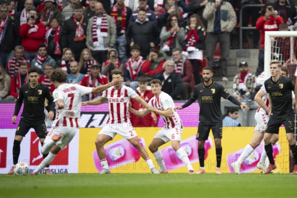 Luca Wald-Schmidt (1.FC Cologne, Storm, #7), Joel Schmied (1.FC Cologne, Defence, #2), Eric Martel (1.FC Cologne, Midfield, #6), COLOGNE, Germany - OCTOBER 18: During the Bundesliga match between FC Cologne vs. FC Augsburg at Rheinenergie-Stadion on matchday 8 of the 1st Bundesliga on October 18, 2025 in Cologne, Germany. DFL REGULATIONS PROHIBIT ANY USE OF PHOTOGRAPHS AS IMAGE SEQUENCES AND/OR QUASI-VIDEO, Rheinenergie-Stadion, Cologne, North Rhine-Westphalia, Germany