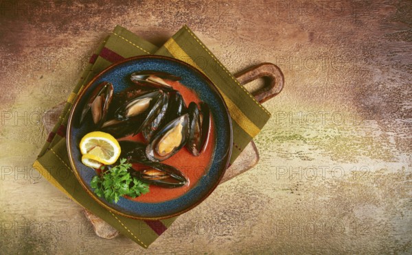 Fra Diavolo mussels, mussels in tomato sauce, Italian dish, on the table, top view, homemade, no people