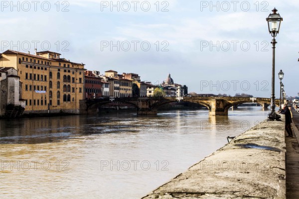 Arno River and Ponte Santa Trinita (Holy Trinity Bridge) in the background. Florence, Province of Florence, Italy
