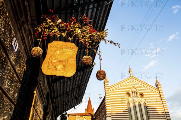 Detail of the front of a café in the historic center of Verona. Verona, Province of Verona, Italy. 10.12.2012