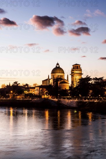Adige River at evening and San Giorgio in Braida Church (Chiesa di San Giorgio in Braida) in the bakground. Verona, Province of Verona, Italy. 09.12.2012