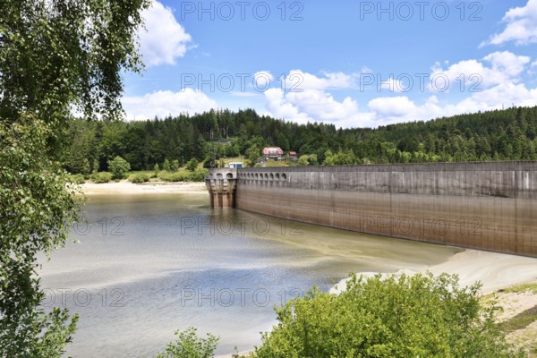 Dam at lake in the Black Forest in Forbach in Germany called Schwarzenbach Reservoir under a clear sky