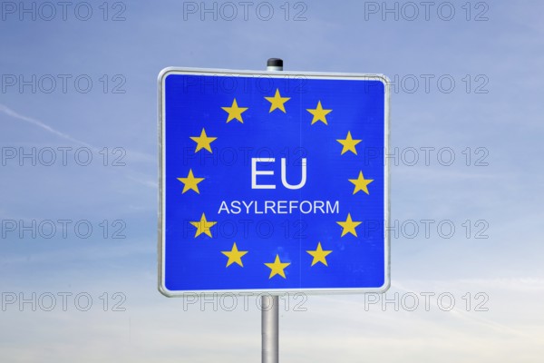 (photo montage) Border sign with the inscription EU ASYLUM REFORM