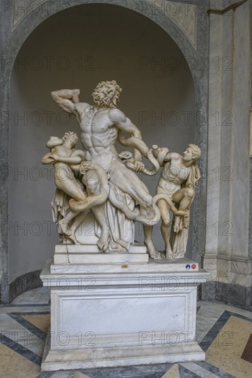 Photo of original ancient marble sculpture Laocoon group of priests Laocoon and his sons fighting with snakes, Museo Pio Clementino, Vatican Museums, Vatican City, Rome, Italy