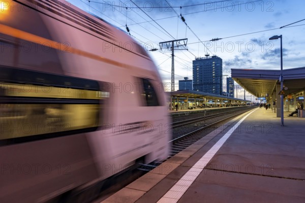 RRX, Rhein-Ruhr-Express, in Essen main station, passengers on the platform, North Rhine-Westphalia, Germany