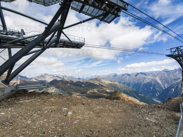 Scenic view from the mountain station of the Gaislachkogel cable car on the Gaislachkogel in the Ötztal Alps down to the Ötztal and to Sölden, Tyrol, Austria