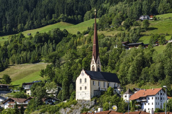 View from the town center to the Oetz Roman Catholic parish church in Ötztal, Tyrol, Austria