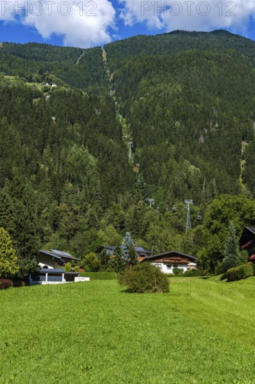 View along the Acherkogel cable car up to Hochoetz, seen from the valley station in Oetz im Ötztal, Tyrol, Austria
