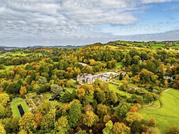 Autumn colours over Bodnant House and Garden from a drone, Conwy River, Colwyn Bay, Conwy, Wales, England, United Kingdom