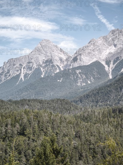 View of Sonnenspitze near Ehrwald in Tyrol, Austria, from south-west from Blindsee in Biberwier, Tyrol, Austria