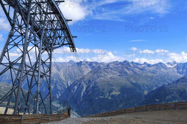 Scenic view from the mountain station of the Gaislachkogel cable car on the Gaislachkogel in the Ötztal Alps down to the Ötztal and to Sölden, Tyrol, Austria