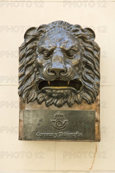 Bronze letterbox in the shape of a lion's head with the inscription Correos y Telegraficos in Old Havana, La Habana Vieja, Havana, Cuba