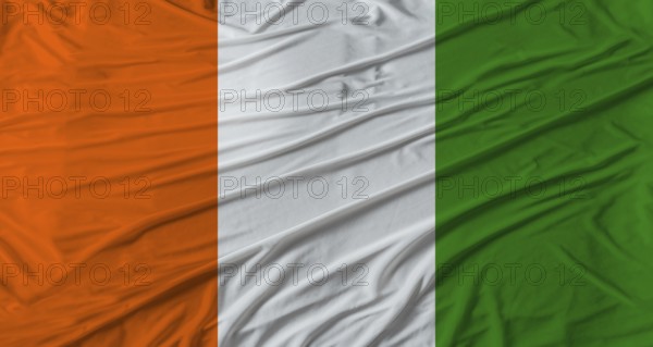 Ivorian flag waving. Flag of Ivory Coast with cloth texture