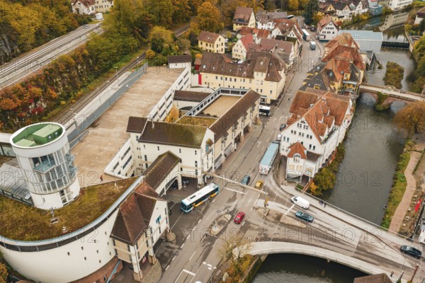 Urban crossroads in autumn, aerial view showing roads, bridges and river, ZOB Calw, Hermann Hessebahn, Calw, Germany