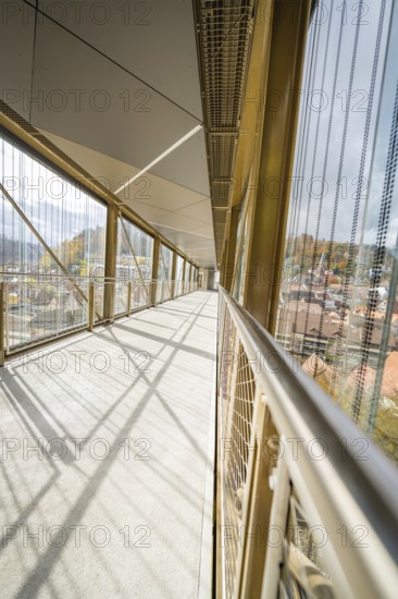 Modern glazed corridor with a view of a city, ZOB Calw, Hermann Hessebahn, Calw, Germany