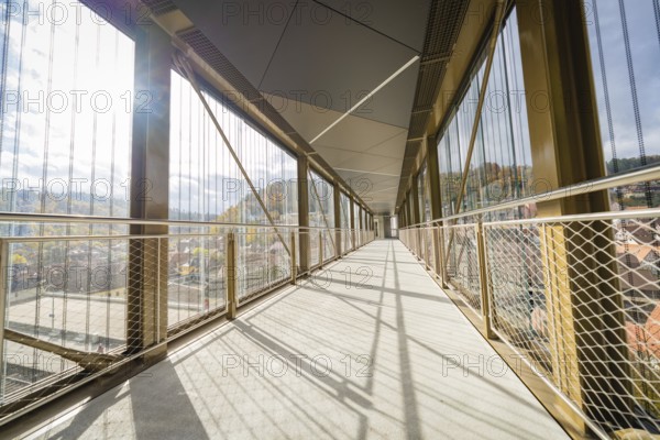 Modern footbridge with sun rays and shadows through the grid, ZOB Calw, Hermann Hessebahn, Calw, Germany