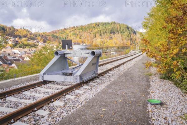 Rail stop on tracks in autumn surroundings near a city, ZOB Calw, Hermann Hessebahn, Calw, Germany