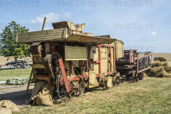 Old stationary thresher at old-fashioned harvest festival in Svenstorp, Ystad municipality, Skåne county, Sweden, Scandinavia