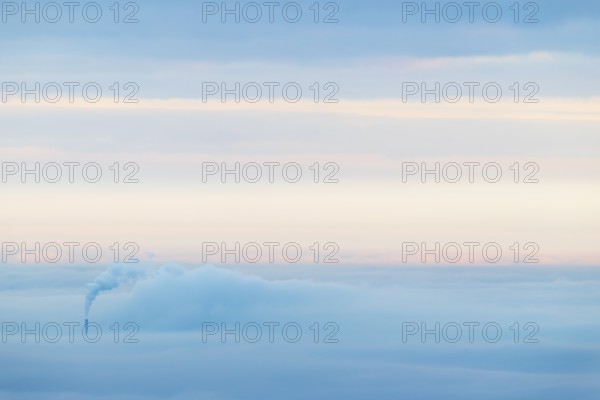 Inversion weather, fog, sunrise, autumn, view from Breitenstein of smoking chimney sticking out of fog, Ochsenwang, Swabian Jura, Baden-Württemberg, Germany