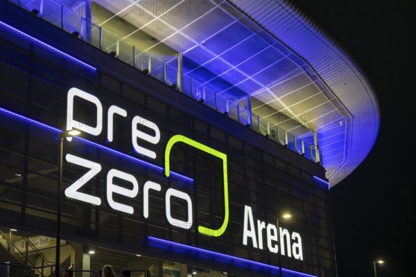 Exterior view of the illuminated Pre-Zero Arena in Sinsheim at dark