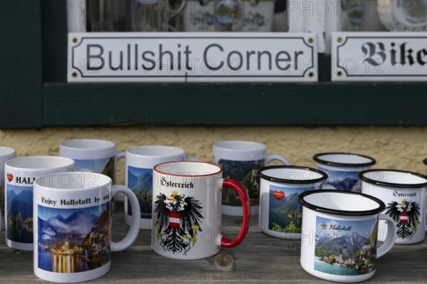 Souvenirs for tourists, detail, cups, Hallstatt, Upper Austria, Salzkammergut, Austria. 29.10.2025 < english> Souvenirs for tourists, detail: mugs, Upper Austria, Austria. October 29, 2025