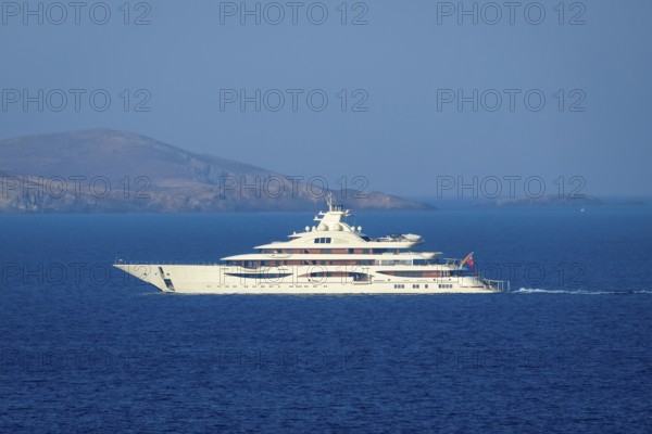 Mykonos, Cyclades, Greece - The Alaiya is a 111.5 meter long luxury motor yacht built in 2019 by the German shipyard Lürssen. It accommodates up to 18 guests in 9 cabins and is owned by Indian steel magnate Lakshmi Mittal. The yacht is equipped with ice-class equipment, a helipad, a private owner area and a cinema room