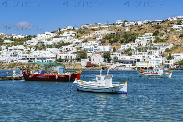 Mykonos, Cyclades, Greece - fishing boats are moored in the old port of Mykonos Town, Mykonos Chora. Mykonos is part of the Cyclades archipelago