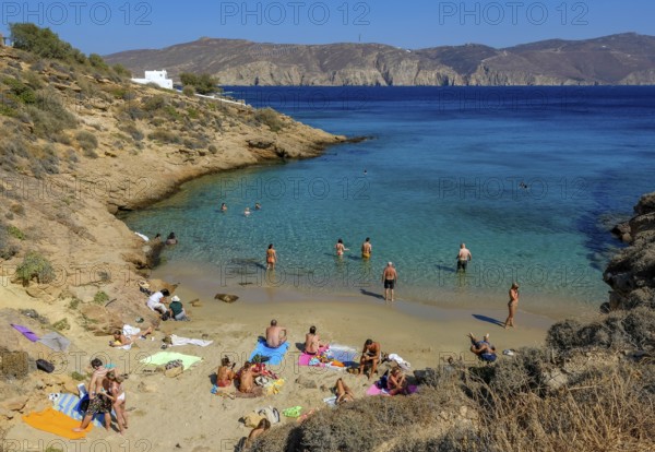 Agios Sostis, Mykonos, Cyclades, Greece - Agios Sostis, small town with the famous restaurant Kikis Tavern, here the small bay LOVERS BEACH directly below the restaurant, sandy beach in the north of the island