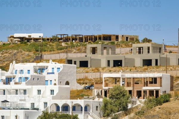 Agios Stefanos, Mykonos, Cyclades, Greece - construction boom, apartment houses in Agios Stefanos, small town with sandy beach, apartments and hotels, north of Mykonos New Port