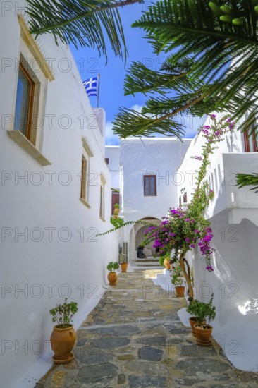 Ano Mera, Mykonos, Cyclades, Greece - The Panagia Tourliana monastery is the center of Ano Mera. The 16th century men's convent on the village square in the interior of the island is now a tourist attraction much visited by tourists