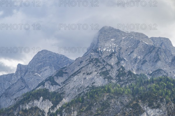 View into the mountains next to Lake Traunsee on a rainy day in spring, Traunstein summit, Traunkirchen, Salzkammergut, Austria