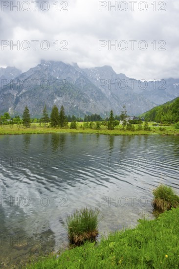 Landscape of Lake Almsee on a rainy day in spring, Salzkammergut, Austria