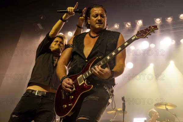 Hannes Braun (singer) and Jim Müller (guitarist) from the band Kissin' Dynamite live on Back with a Bang World Tour at Capitol Hannover on 09.11.2025