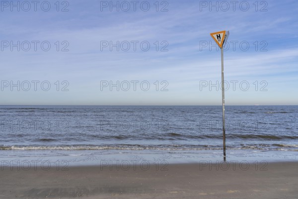 East Frisian North Sea island of Spiekeroog, Wadden Sea National Park, in winter, SOS, emergency call sign, east beach, beach section