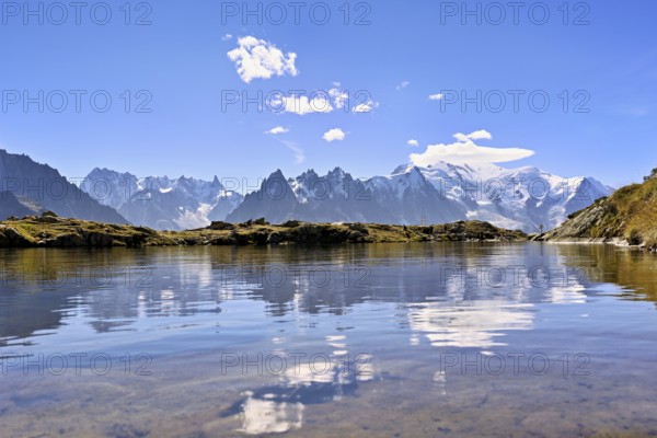 Lac de Chésserys, with the snow-covered Mont Blanc massif in the background, Chamonix-Mont-Blanc, Haute-Savoie, France