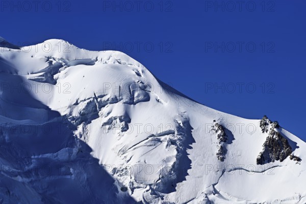 Detailed view of snow-covered Mont-Blanc, Aiguille du Midi mountain station viewing platform, Chamonix-Mont-Blanc, Haute-Savoie, France