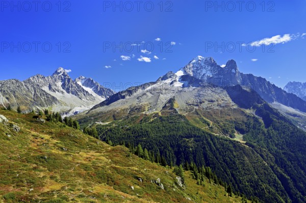 From left Aiguille du Chardonnet, in front foothills of the Argentière Glacier, on the right snow-covered Aiguille Verte, Aiguille du Dru, Chamonix-Mont-Blanc, Haute-Savoie, France