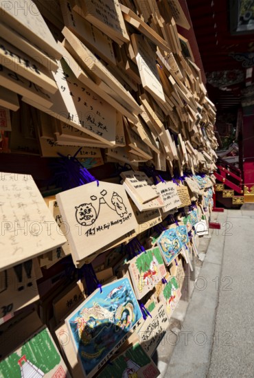 Ema, small wooden tablets with wishes and prayers, hung so that the Kami spirits or gods can receive them, Hakone Shrine, Hakone, Japan