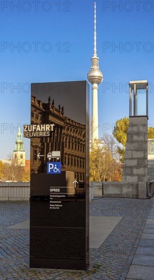Black information columns with signs and signs on the forecourt of the Humboldt Forum Berlin, Germany