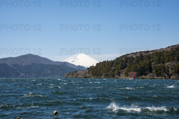 View of Lake Ashi with Mount Fuji volcano and peace torii from Hakone Shrine, Hakone, Japan