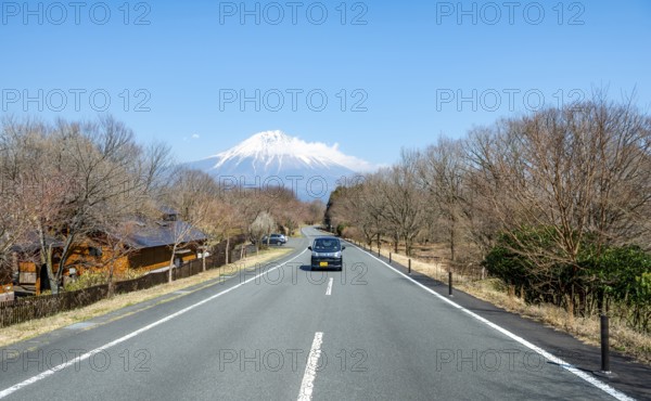 Car on road, road leads to Mount Fuji volcano, wanderlust, Yamanashi Prefecture, Japan