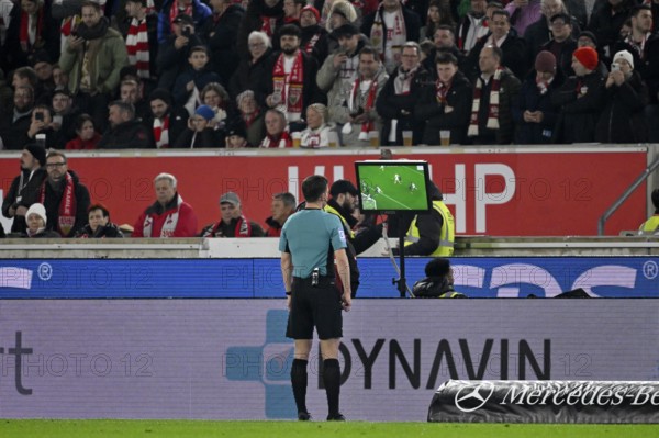 Referee Harm Osmers looks on VAR monitor, video assistant, video evidence, video referee video assistant referee MHPArena, MHP Arena Stuttgart, Baden-Württemberg, Germany