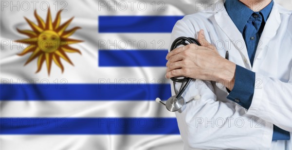 Uruguay healthcare concept. Doctor with stethoscope on Uruguay flag. Doctor holding stethoscope on Uruguayan flag