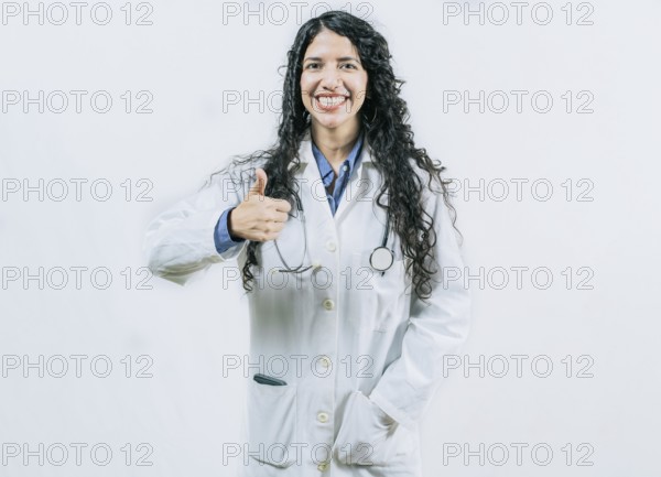 Smiling doctor approving something isolated. Female doctor gesturing OK isolated