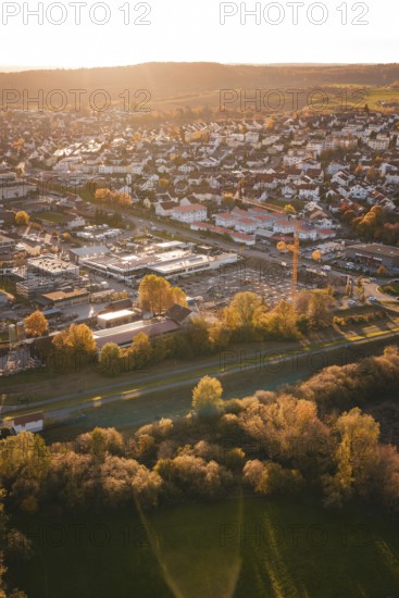 City and surrounding nature in soft autumn light, residential areas clearly visible, Grossbottwar, Germany
