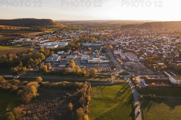 Overview of a town in autumn, surrounded by fields, at sunset, Großbottwar, Germany