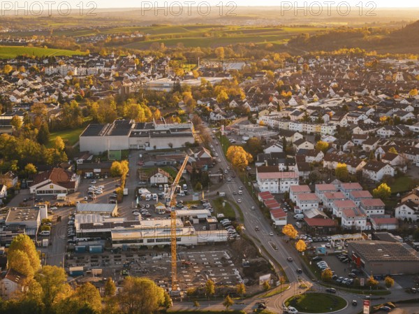 City view with clear streets and warm evening autumn light, Grossbottwar, Germany
