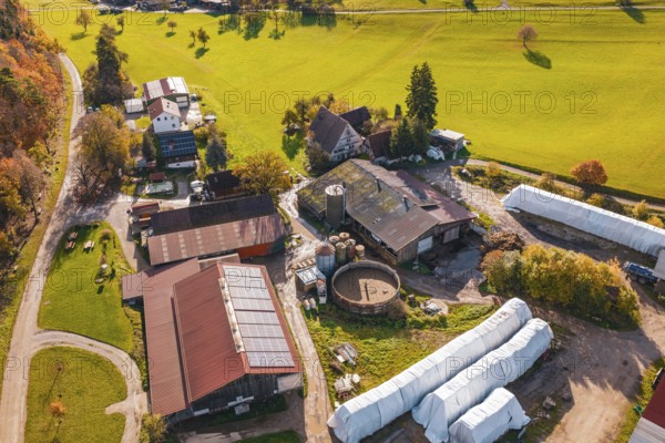 Aerial view of a farm with buildings and agricultural land in autumn surroundings, Haselstaller Hof, Gechingen, Germany